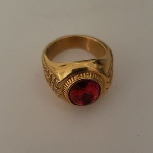 Gold plated ring with red stone